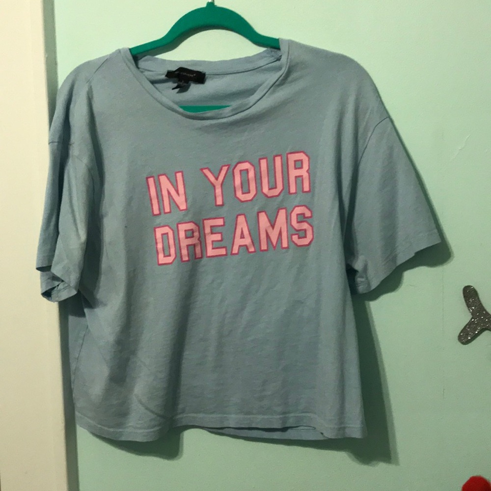 Blue crop top with saying on it